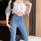 Högmidjade elastiska mikroutsvängda jeans