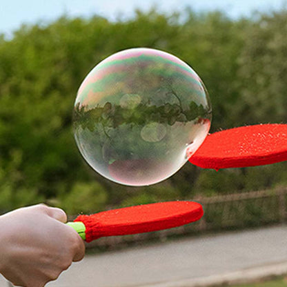 Interaktivt bubbelspel med pingisracket för barn