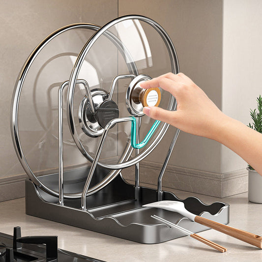 Multifunktionell hållare för grytlock och skärbrädor