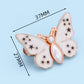 Midjeknapp med fjärilsdesign för snabb justering