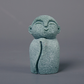 Mini fridfull Zen-munkfigurin