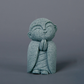 Mini fridfull Zen-munkfigurin
