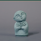 Mini fridfull Zen-munkfigurin